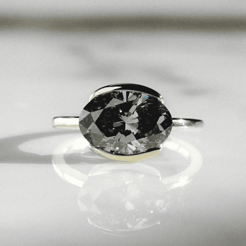Grey Moissanite Oval cut half bezel set engagement ring, 3 carat oval dark grey moissanite east west horizontal moissanite