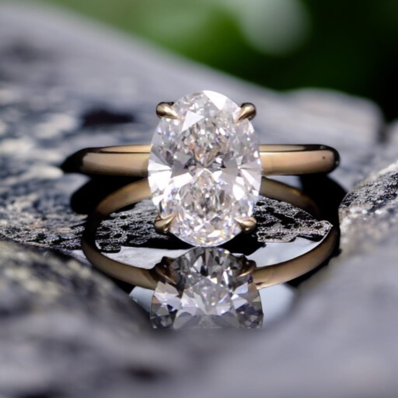 Oval-Cut Diamond Solitaire Ring in Yellow Gold