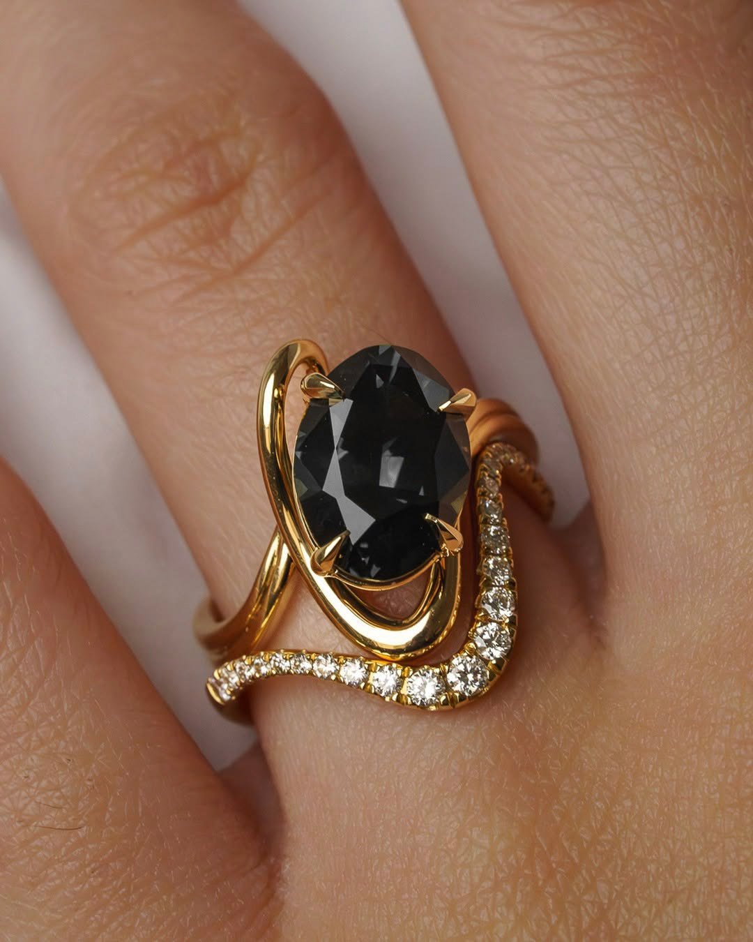 Shop this 3 carat oval grey moissanite rapture ring. A modern, minimalist engagement ring made with ethical moissanite and customizable metal options.