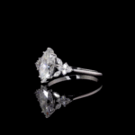 Elegant marquise-cut diamond ring with pear and round accent diamonds