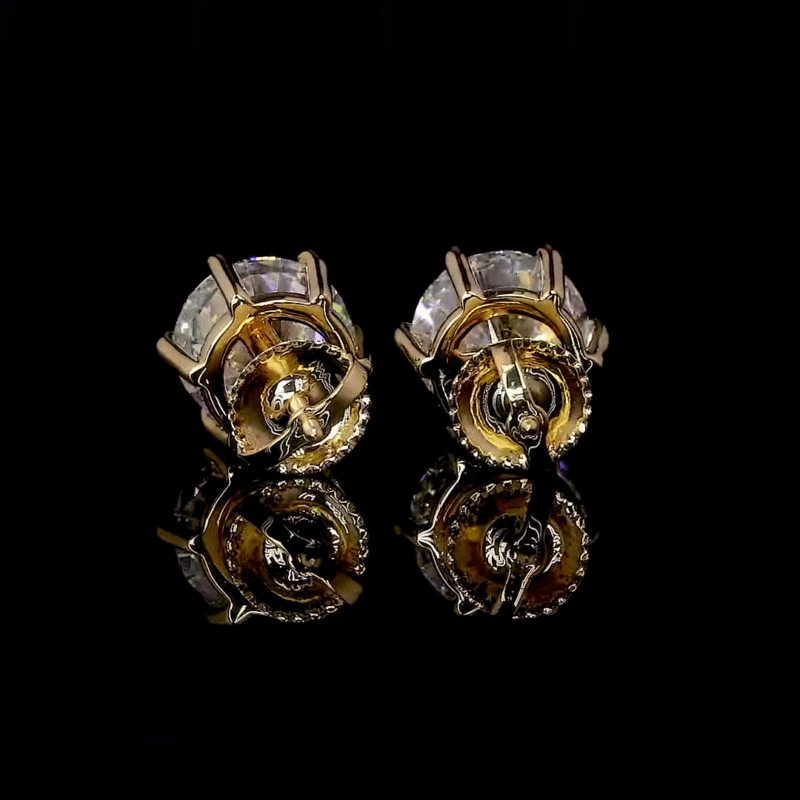 Timeless and radiant, these stud earrings for women hold lab grown 2 carat diamonds in vintage-inspired settings with classic push back fasteners.
