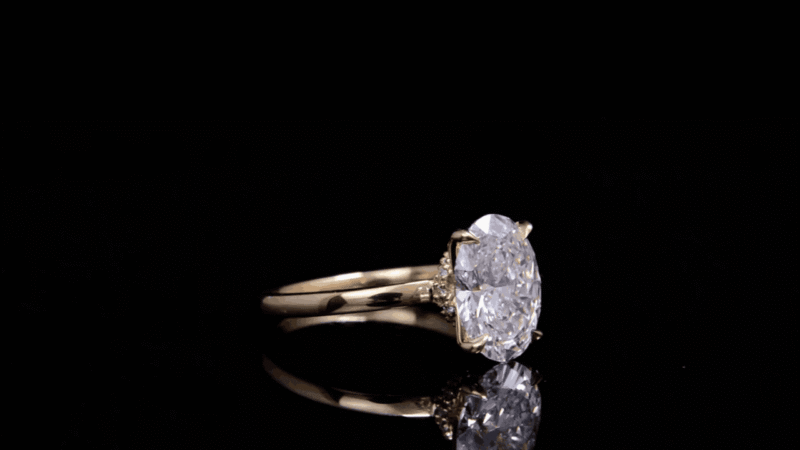 oval diamond ring, solitaire engagement ring, yellow gold engagement ring, minimalist diamond ring, vevajewel ring, elegant proposal ring, modern solitaire ring, timeless engagement ring, oval cut diamond, classic gold ring