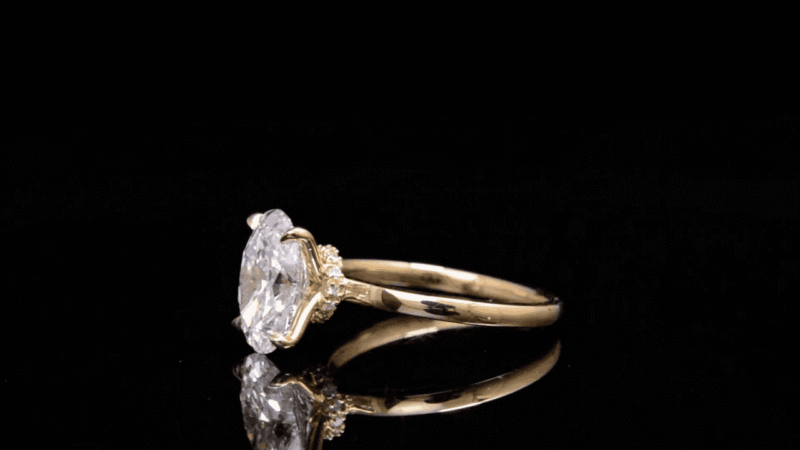 oval diamond ring, solitaire engagement ring, yellow gold engagement ring, minimalist diamond ring, vevajewel ring, elegant proposal ring, modern solitaire ring, timeless engagement ring, oval cut diamond, classic gold ring
