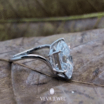Hand wearing Dutch marquise cut lab diamond ring in white gold band