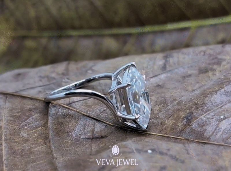 Hand wearing Dutch marquise cut lab diamond ring in white gold band