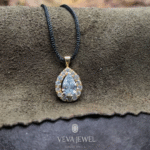 Pear shape diamond pendant necklace with halo in gold