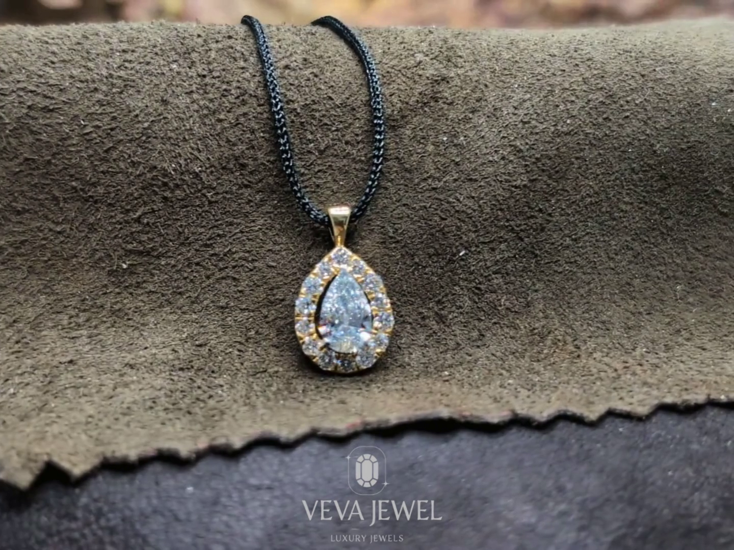 Pear shape diamond pendant necklace with halo in gold