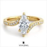 Elegant marquise cut moissanite engagement ring with sculpted curved gold band, bypass design, modern romantic style, perfect for unique bridal jewelry lovers.