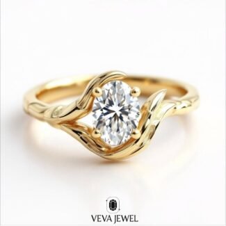 Oval cut diamond ring with leaf design in yellow gold