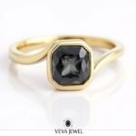 Grey cushion cut moissanite engagement ring in gold