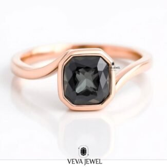 Bezel set grey moissanite ring with bypass band