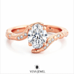 elegant gold bypass ring with oval moissanite stone