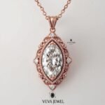 vintage moissanite pendant in yellow gold