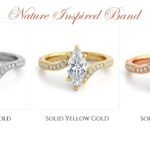 Artistic marquise cut moissanite ring set in a bypass style gold band, handcrafted for a modern yet timeless romantic engagement look.