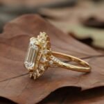 vintage art deco emerald cut diamond ring in gold