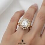 vintage inspired halo engagement ring in yellow gold
