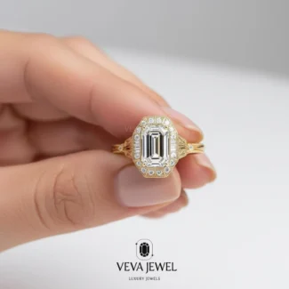 Gold halo ring with emerald cut center diamond
