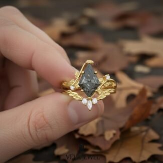 Unique kite shaped moissanite ring with leaf design