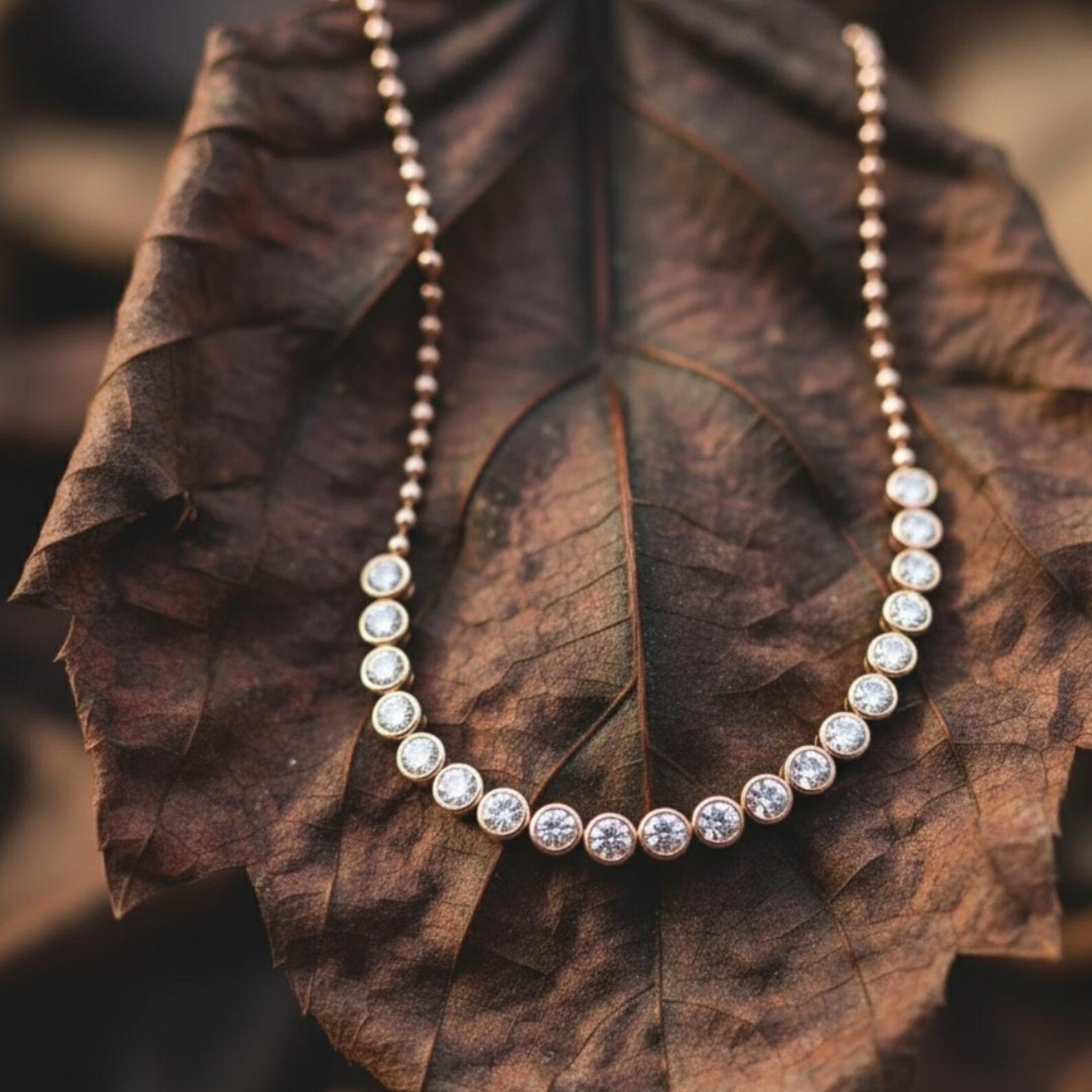 Gold necklace with bezel set lab diamonds
