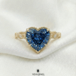 Blue heart shape diamond engagement ring in gold