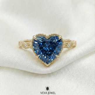 Blue heart shape diamond engagement ring in gold