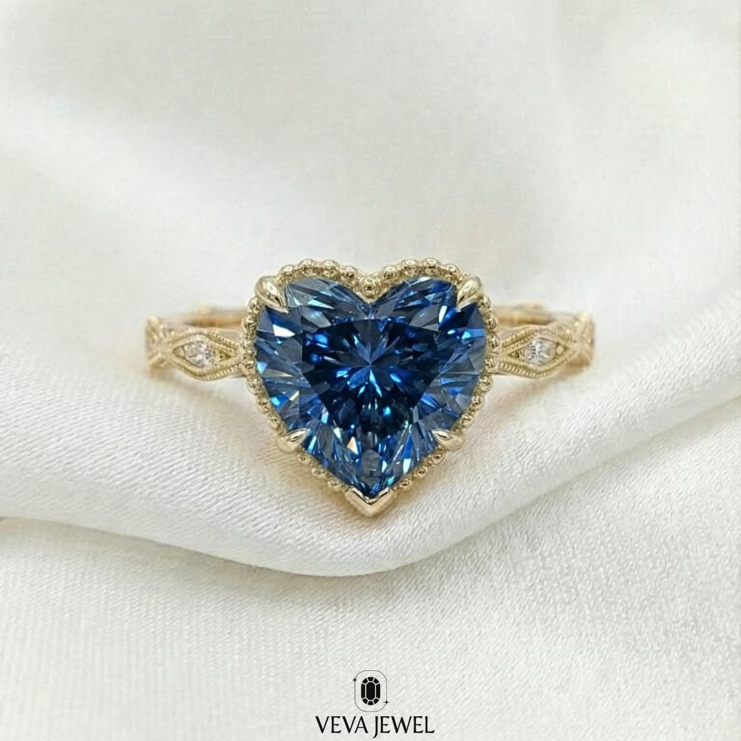 Blue heart shape diamond engagement ring in gold
