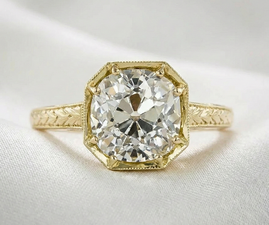 old mine cut moissanite ring in yellow gold bezel setting