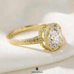 Vintage style moissanite engagement ring with milgrain detail