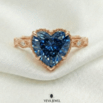 Classic engagement ring with blue diamond