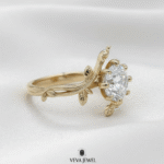 nature inspired gold engagement ring with round diamond