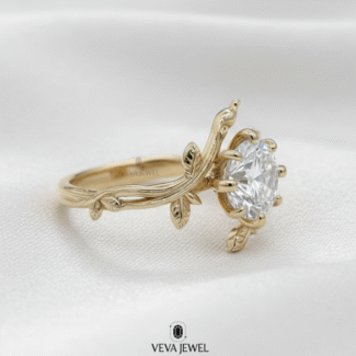 nature inspired gold engagement ring with round diamond