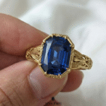 vintage blue sapphire solitaire ring in engraved band