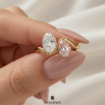 Yellow gold bypass ring with oval white and blush pink gemstones