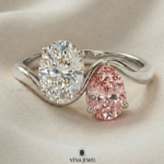 Handmade gold ring with oval moissanite and pink sapphire stones