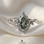 Grey moissanite ring in floral vine setting