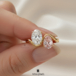 Romantic two stone engagement ring with oval white and pink gems