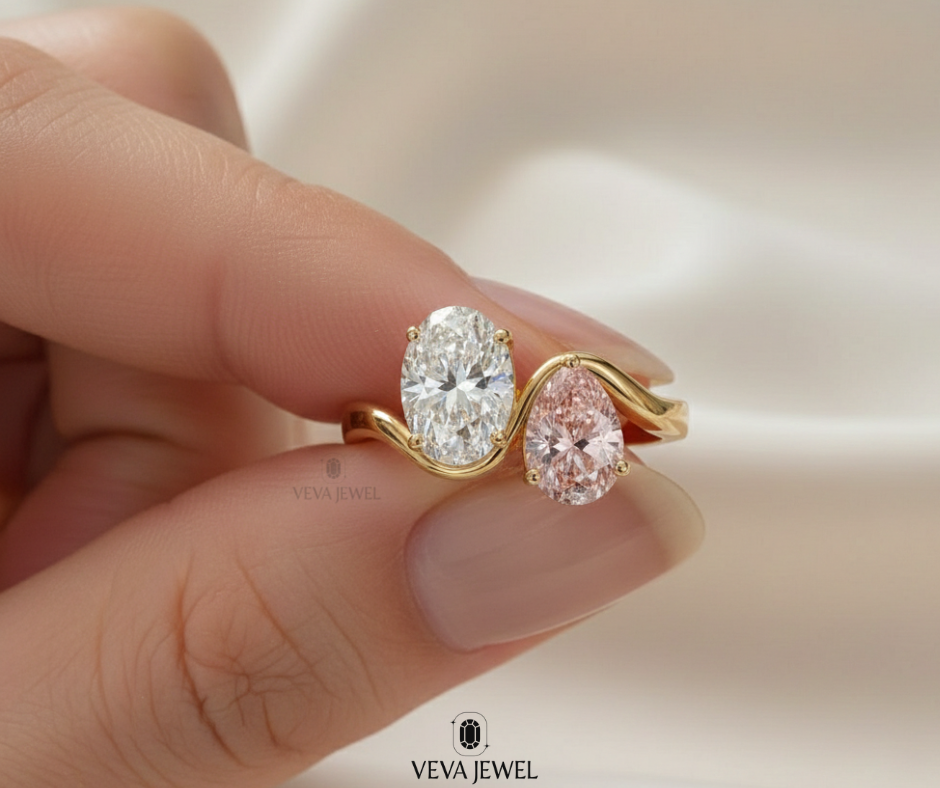 Romantic two stone engagement ring with oval white and pink gems