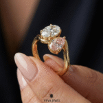 Luxury gold ring with oval moissanite and pink diamond design