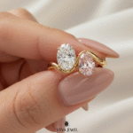 Unique dual stone ring with oval cut clear and pink diamonds