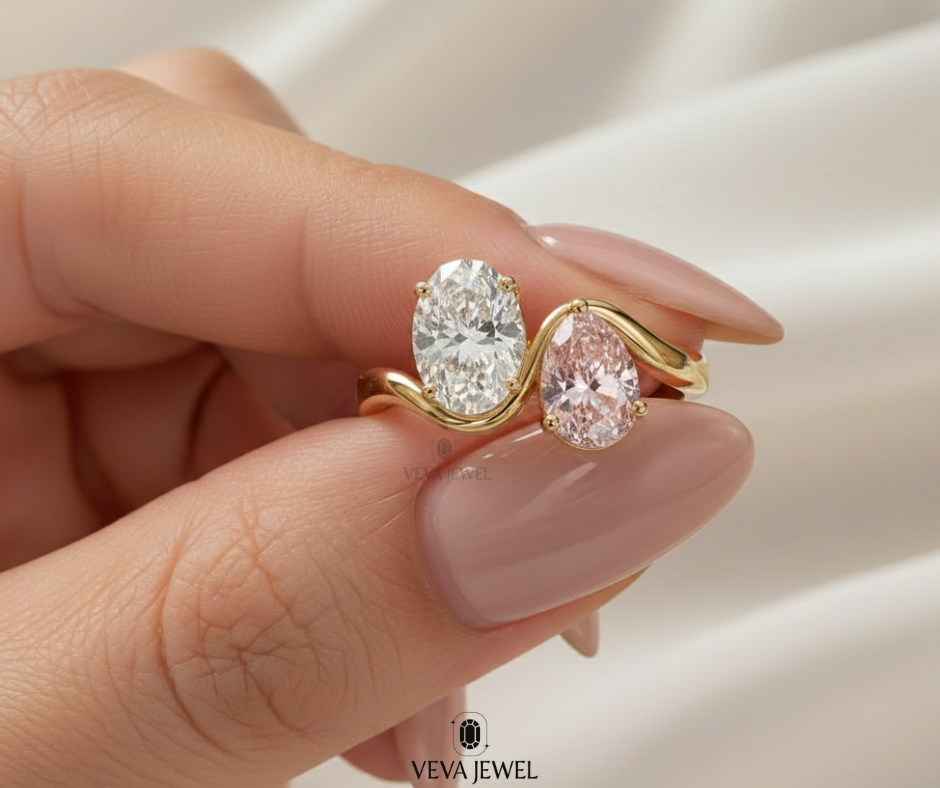 Unique dual stone ring with oval cut clear and pink diamonds