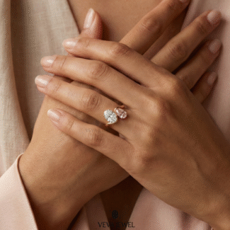 Elegant two stone engagement ring with white and pink oval stones