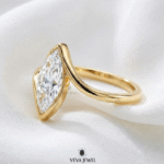 Elegant marquise solitaire engagement ring in yellow gold