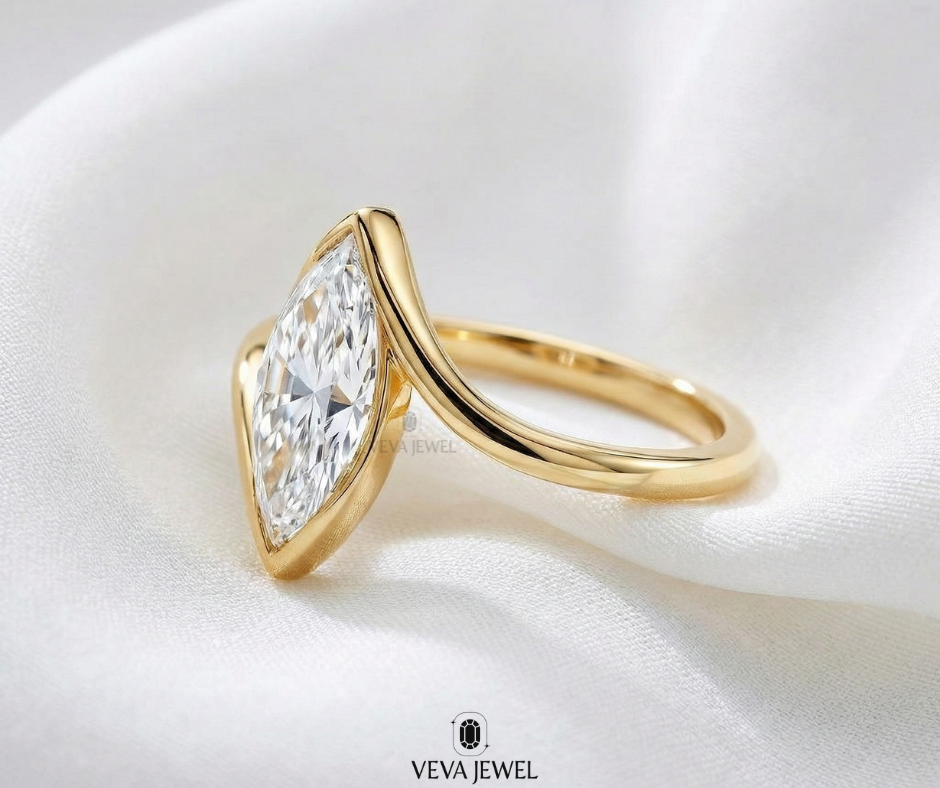 Elegant marquise solitaire engagement ring in yellow gold